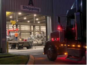 Outside a Kenwal Steel facility, specifically by the Shipping dock where well packaged steel products are being picked up to ship to Kenwal’s customers.